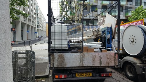 Professional waste removal team handling commercial trash in Hayes